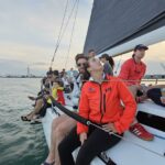 Quiet gathering under sail on the Detroit River